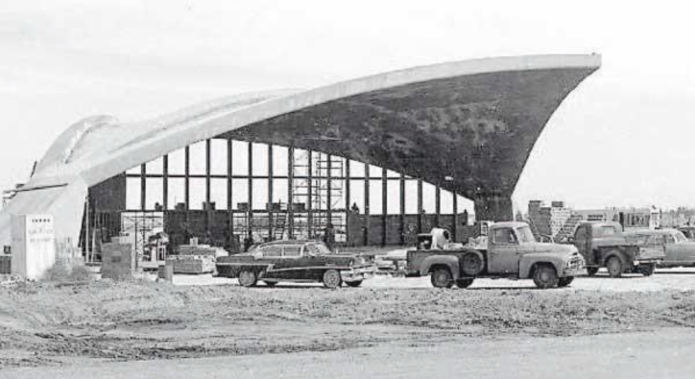 a truck is parked in front of a building