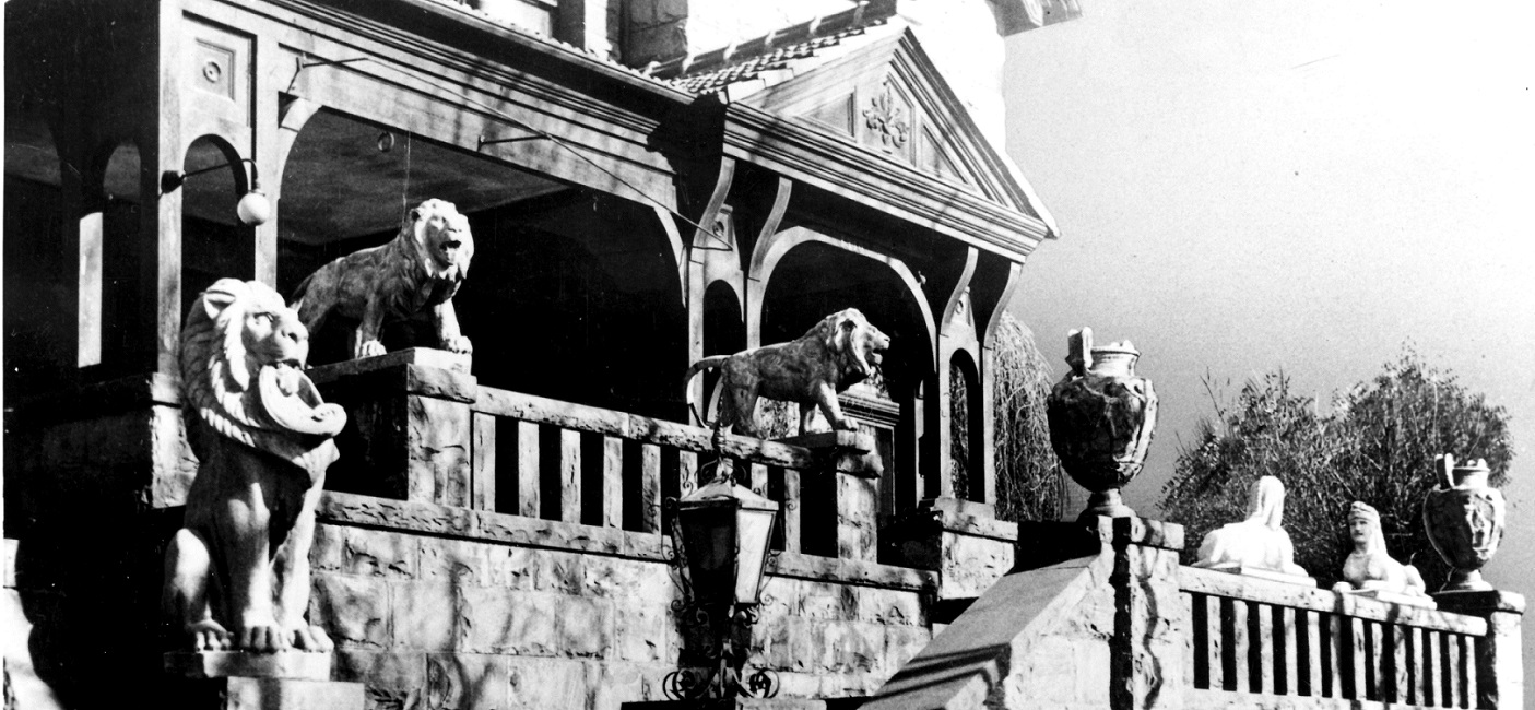 a group of people standing in front of a building