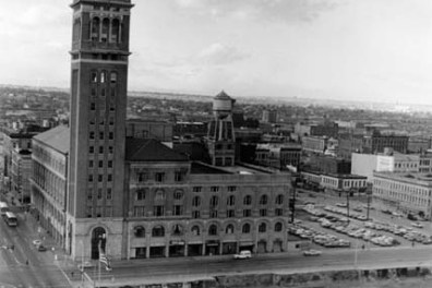 a large clock tower towering over a city