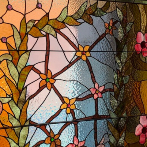 a building with graffiti on the side of a window