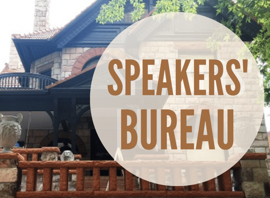 a sign in front of a building